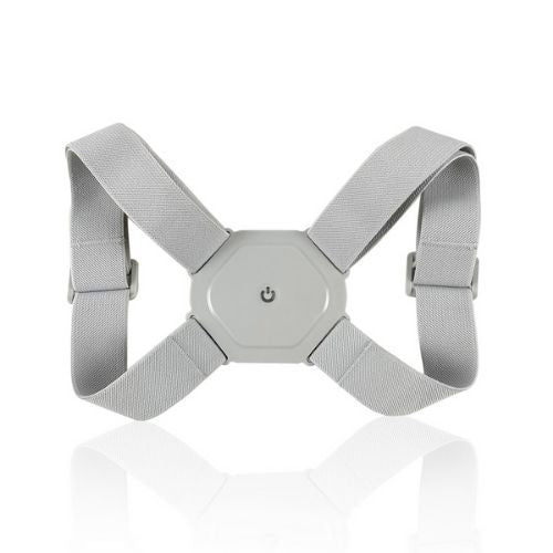 Slim vibrating posture corrector worn under a shirt with adjustable straps.
