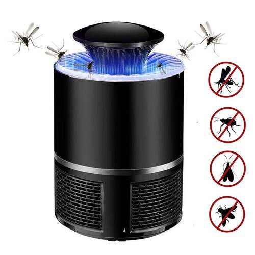 Mosquito killer lamp glowing with UV light surrounded by insects at dusk.

