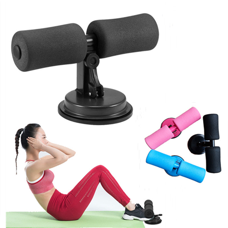 Sit‑up bar with suction base attached to the floor
