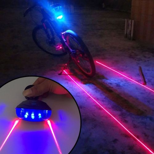 Close-up of waterproof LED rear bike light with multiple modes.  
