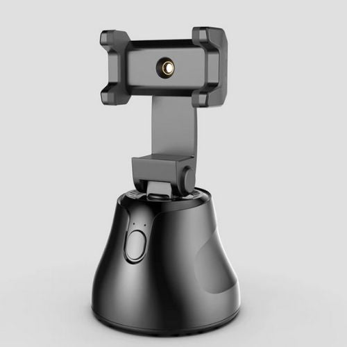 Close-up of 360 degree auto tracking phone holder rotating with smartphone mounted.  
