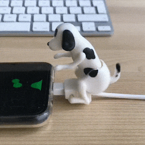Close-up of novelty dog-shaped USB charger in action.  
