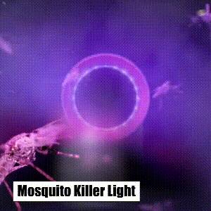 Portable UV mosquito killer lamp placed on patio table in outdoor evening setting.
