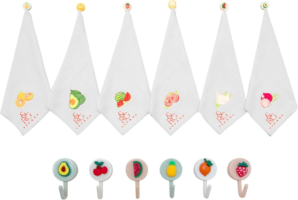 Stack of six folded microfiber towels tied with a ribbon on a countertop, styled as a housewarming or BBQ gift set.
