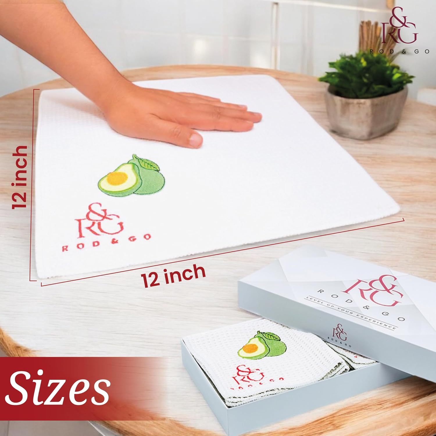 Stack of six folded microfiber towels tied with a ribbon on a countertop, styled as a housewarming or BBQ gift set.